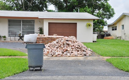 Various types of builders waste including concrete, wood, and metal scraps