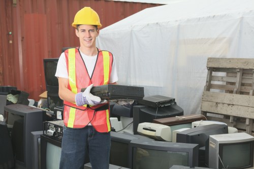 Clean and organized construction site after waste clearance in Coney Hall