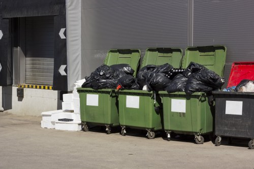 Professional waste collectors at work in Coney Hall
